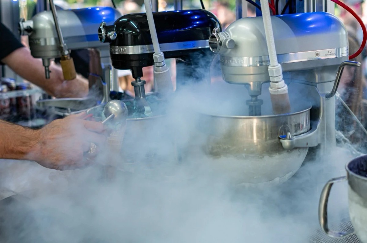 Liquid nitrogen fog billowing over the commercial mixers mid-service