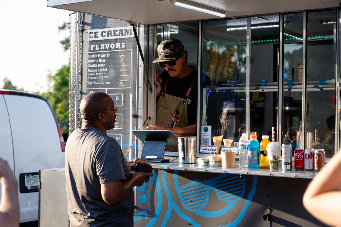 A guest ordering from the Polar Bros flavor board